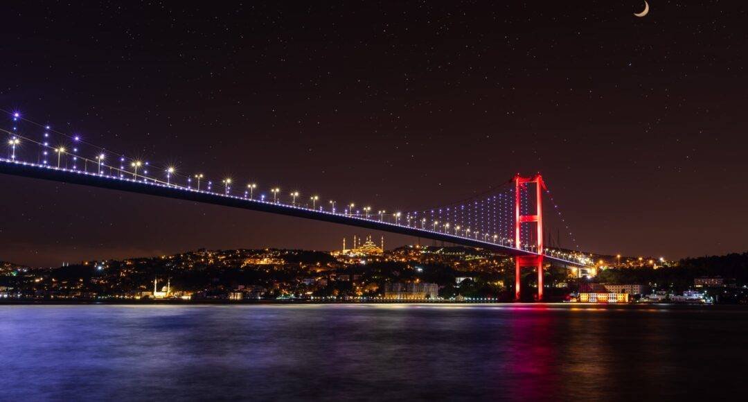 Illuminated bosphorus bridge at night, istanbul, turkey.