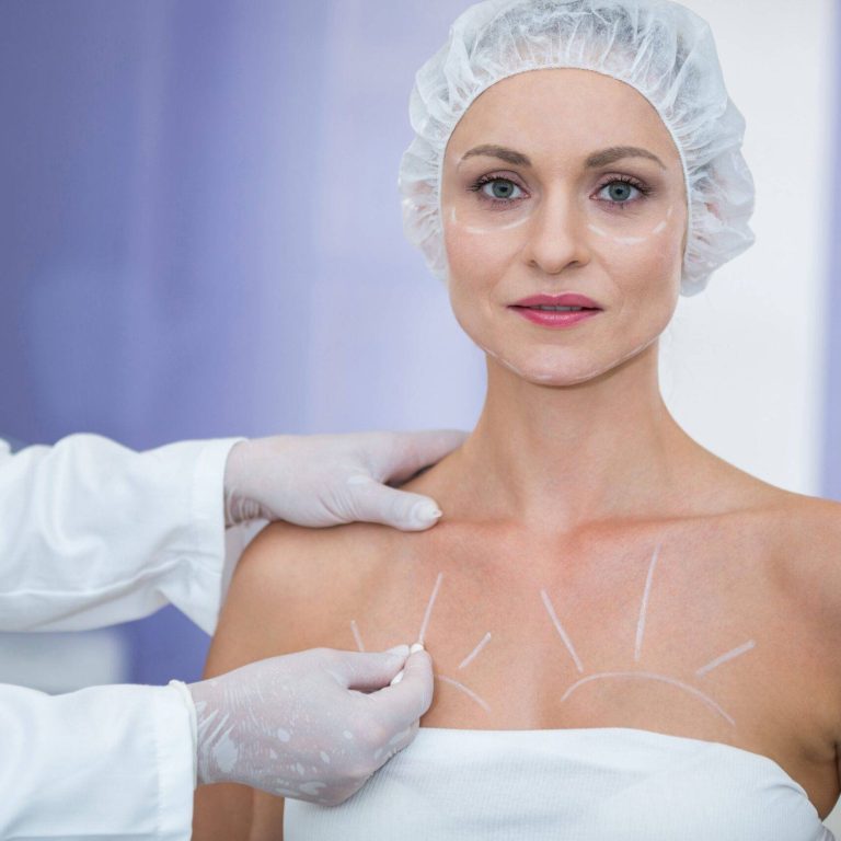 doctor-marking-female-patients-body-breast-surgery-min